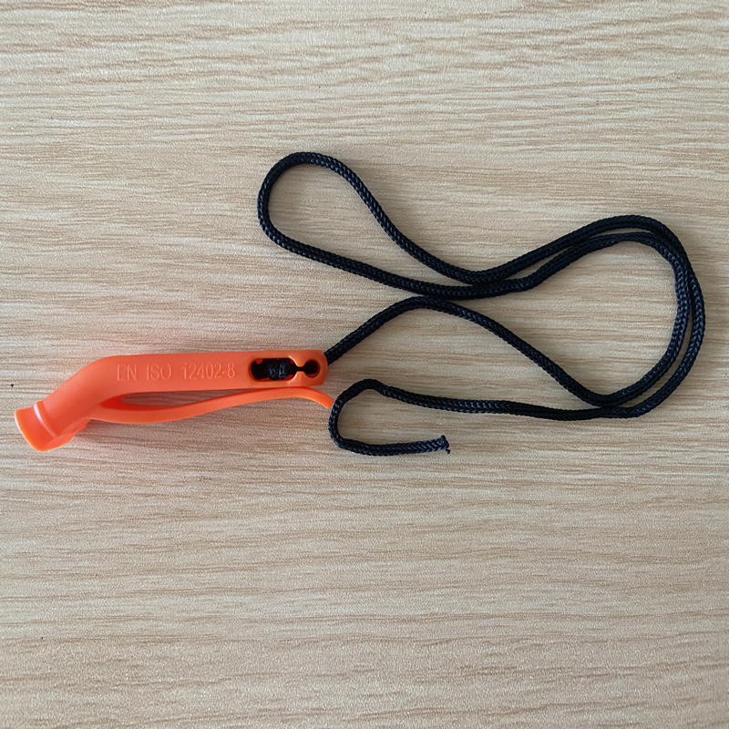 Orange whistle with clip and lanyard Orange whistle with clip and lanyard